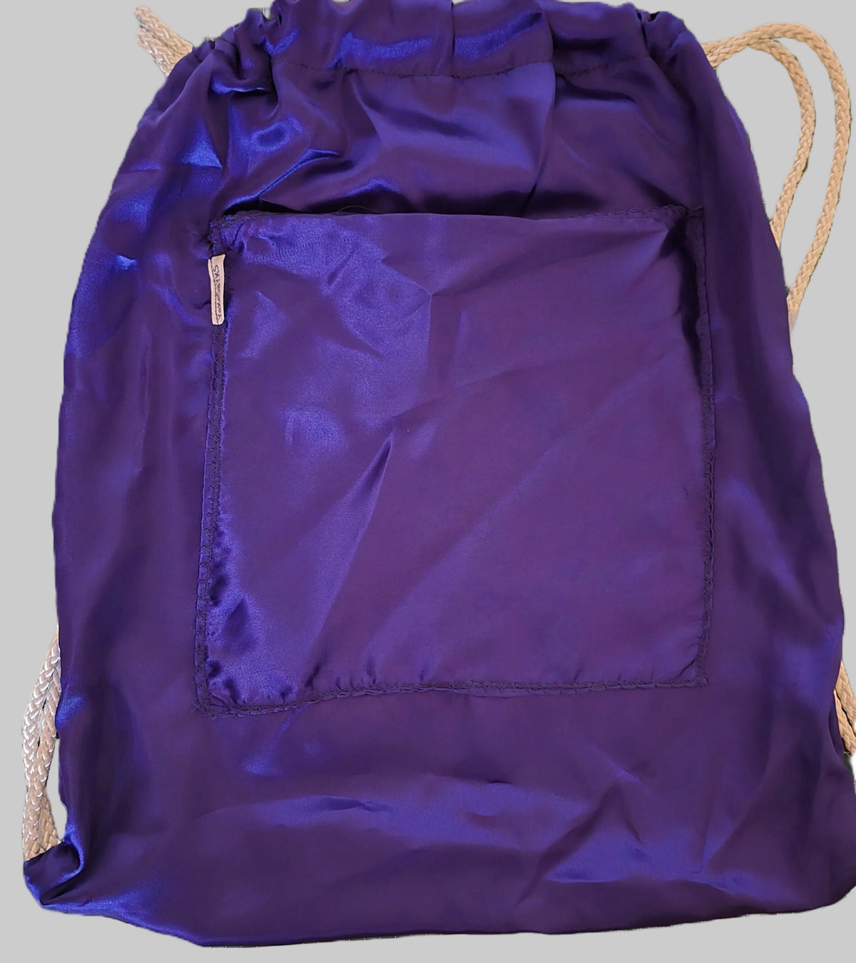 Kids' blue satin drawstring bag with a front pocket and drawstring shoulder straps.